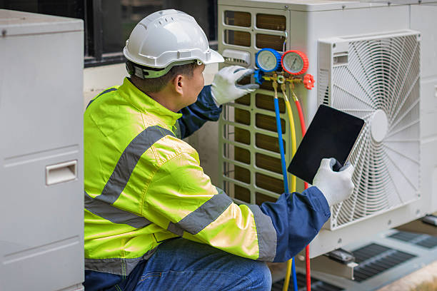 Professional Air Duct Cleaning technician working in Saint Simons Island, GA